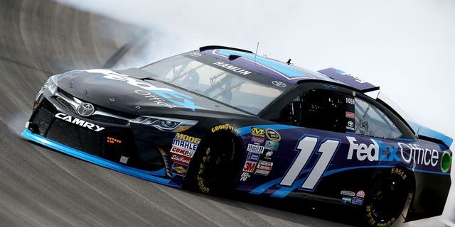 LAS VEGAS, NV - MARCH 03: Denny Hamlin, driver of the #11 FedEx Office Toyota, spins out during Testing at Las Vegas Motor Speedway on March 3, 2016 in Las Vegas, Nevada. (Photo by Sean Gardner/NASCAR via Getty Images)