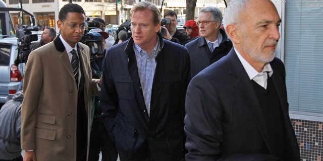 March 4: NFL outside labor counsel Bob Batterman, right, followed by Paul Hicks, Executive VP/Communications & Government Affairs, and NFL commissioner Roger Goodell arrive for football labor negotiations with the NFL players involving a federal mediator in Washington.