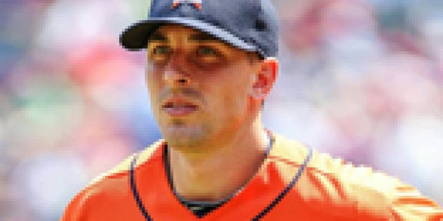 Jul 7, 2013; Arlington, TX, USA; Houston Astros catcher Jason Castro (15) jogs off the field during the game against the Texas Rangers at Rangers Ballpark in Arlington. Texas won 5-4. Mandatory Credit: Kevin Jairaj-USA TODAY Sports