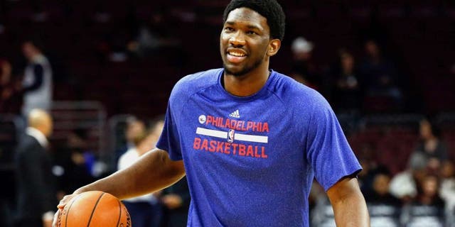 Jan 5, 2015; Philadelphia, PA, USA; Philadelphia 76ers injured center Joel Embiid (21) during warm ups before a game against the Cleveland Cavaliers at Wells Fargo Center. Mandatory Credit: Bill Streicher-USA TODAY Sports