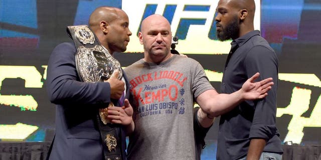 LAS VEGAS, NV - MARCH 04: (L-R) Opponents Daniel Cormier and Jon Jones face off during the UFC Unstoppable launch press conference at the MGM Grand Garden Arena on March 4, 2016 in Henderson, Nevada. (Photo by Josh Hedges/Zuffa LLC/Zuffa LLC via Getty Images)