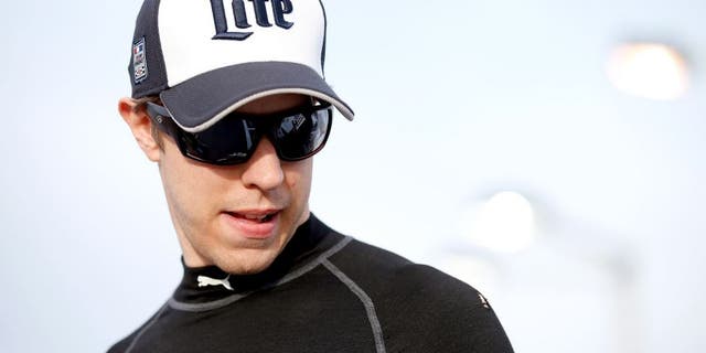 LAS VEGAS, NV - MARCH 04: Brad Keselowski, driver of the #2 Miller Lite Ford, stands on pit row during qualifying for the NASCAR Sprint Cup Series Kobalt 400 at Las Vegas Motor Speedway on March 4, 2016 in Las Vegas, Nevada. (Photo by Todd Warshaw/Getty Images)