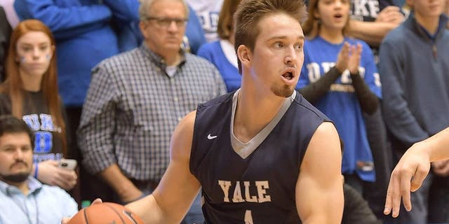 DURHAM, NC - NOVEMBER 25: Jack Montague #4 of the Yale Bulldogs moves the ball against the Duke Blue Devils at Cameron Indoor Stadium on November 25, 2015 in Durham, North Carolina. Duke defeated Yale 80-61. (Photo by Lance King/Getty Images)