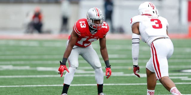 COLUMBUS, OH - NOVEMBER 22: Eli Apple #13 of the Ohio State Buckeyes in action against the Indiana Hoosiers during the game at Ohio Stadium on November 22, 2014 in Columbus, Ohio. Ohio State defeated Indiana 42-27. (Photo by Joe Robbins/Getty Images)