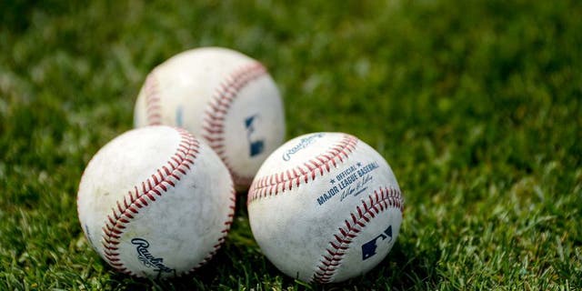 Mar 5, 2014; Dunedin, FL, USA; Baseballs sit on the field before the spring training game between the Pittsburg Pirates and Toronto Blue Jays at Florida Auto Exchange Park. Mandatory Credit: Jonathan Dyer-USA TODAY Sports