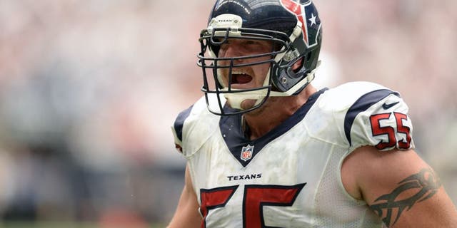 Sep 15, 2013; Houston, TX, USA; Houston Texans center Chris Myers (55) celebrates the winning touchdown against the Tennessee Titans during overtime at Reliant Stadium. The Texans won 30-24. Mandatory Credit: Thomas Campbell-USA TODAY Sports