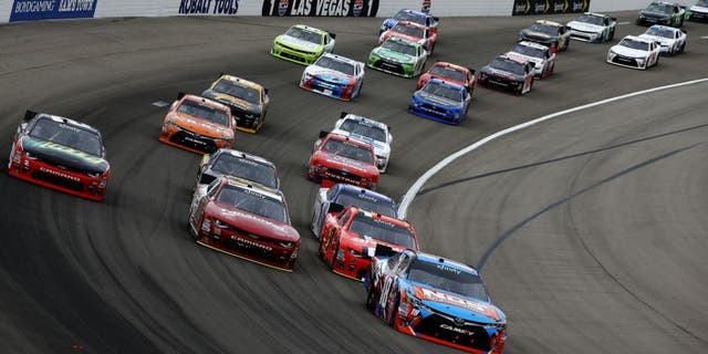 LAS VEGAS, NV - MARCH 05: Kyle Busch, driver of the #18 NOS Energy Drink Toyota, leads the field during the NASCAR Xfinity Series Boyd Gaming 300 at Las Vegas Motor Speedway on March 5, 2016 in Las Vegas, Nevada. (Photo by Sean Gardner/NASCAR via Getty Images)