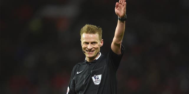 MANCHESTER, ENGLAND - MARCH 02: Referee Mike Jones gestures during the Barclays Premier League match between Manchester United and Watford at Old Trafford on March 2, 2016 in Manchester, England. (Photo by Laurence Griffiths/Getty Images)