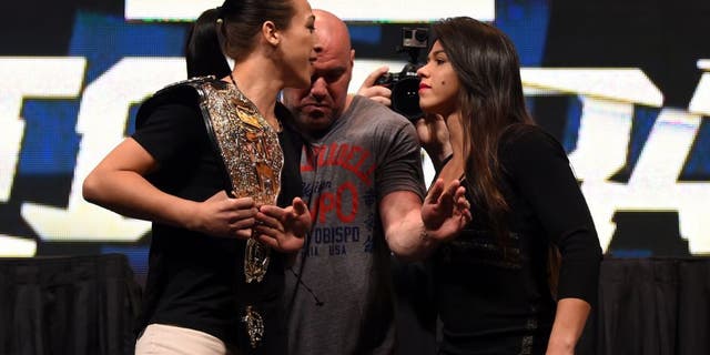 LAS VEGAS, NV - MARCH 04: (L-R) Opponents Joanna Jedrzejczyk and Claudia Gadelha face off during the UFC Unstoppable launch press conference at the MGM Grand Garden Arena on March 4, 2016 in Henderson, Nevada. (Photo by Josh Hedges/Zuffa LLC/Zuffa LLC via Getty Images)