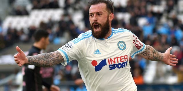 Marseille's Scottish forward Steven Fletcher celebrates after scoring a goal during the French L1 football match between Marseille and Toulouse on March 6, 2016 at the Velodrome stadium in Marseille, southern France. AFP PHOTO / ANNE-CHRISTINE POUJOULAT / AFP / ANNE-CHRISTINE POUJOULAT (Photo credit should read ANNE-CHRISTINE POUJOULAT/AFP/Getty Images)