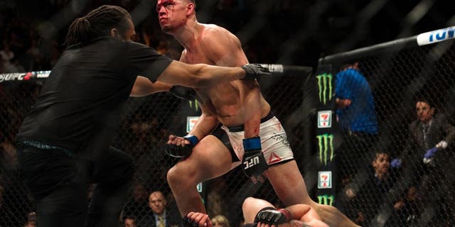 LAS VEGAS, NV - MARCH 5: Nate Diaz (top) submits Conor McGregor in their welterweight bout during the UFC 196 in the MGM Grand Garden Arena on March 5, 2016 in Las Vegas, Nevada. (Photo by Brandon Magnus/Zuffa LLC/Zuffa LLC via Getty Images)