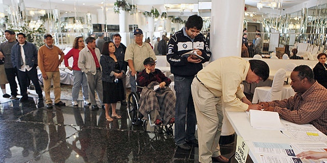 March 8: oters stand in line to cast their ballots in the special election in Bell, Calif.