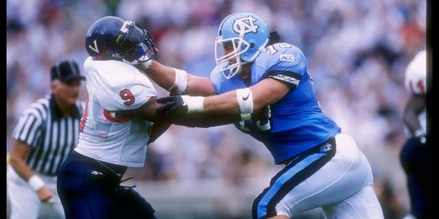 27 Sep 1997: Ryan Hoffman (right) of North Carolina battles Shannon Taylor #9 of the Virginia Cavaliers during the Tar Heels 48-20 win at Kenan Stadium in Chapel Hill, North Carolina. Mandatory Credit: Doug Pensinger /Allsport