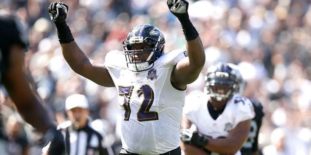 OAKLAND, CA - SEPTEMBER 20: Kelechi Osemele #72 of the Baltimore Ravens celebrates a touchdown in the second quarter against the Oakland Raiders at Oakland-Alameda County Coliseum on September 20, 2015 in Oakland, California. (Photo by Ezra Shaw/Getty Images)
