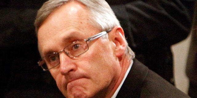 March 8: Ohio State football coach Jim Tressel, left, sits next to E. Gordon Gee, Ohio State University president, during a news conference in Columbus, Ohio.