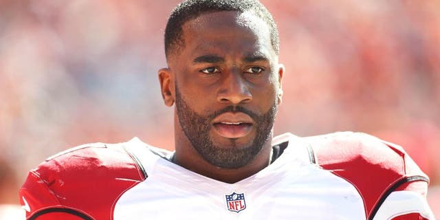 Oct 5, 2014; Denver, CO, USA; Arizona Cardinals outside linebacker Alex Okafor (57) before the game against the Denver Broncos at Sports Authority Field at Mile High. Mandatory Credit: Chris Humphreys-USA TODAY Sports