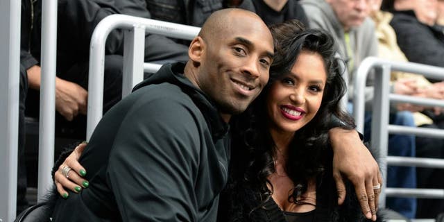 LOS ANGELES, CA - MARCH 09: Los Angeles Lakers Guard Kobe Bryant and his wife Vanessa Bryant pose for a photo during a game between the Los Angeles Kings and the Washington Capitals at STAPLES Center on March 09, 2016 in Los Angeles, California. (Photo by Andrew D. Bernstein/NHLI via Getty Images) *** Local Caption ***