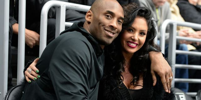 LOS ANGELES, CA - MARCH 09: Los Angeles Lakers Guard Kobe Bryant and his wife Vanessa Bryant pose for a photo during a game between the Los Angeles Kings and the Washington Capitals at STAPLES Center on March 09, 2016 in Los Angeles, California. (Photo by Andrew D. Bernstein/NHLI via Getty Images) *** Local Caption ***