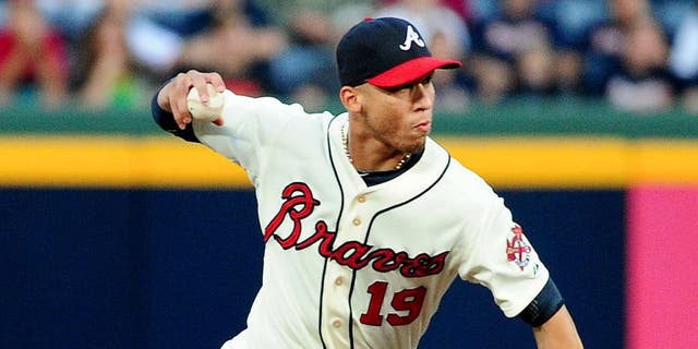 ATLANTA, GA - SEPTEMBER 14: Andrelton Simmons #19 of the Atlanta Braves makes a throw against the San Diego Padres at Turner Field on September 14, 2013 in Atlanta, Georgia. (Photo by Scott Cunningham/Getty Images)