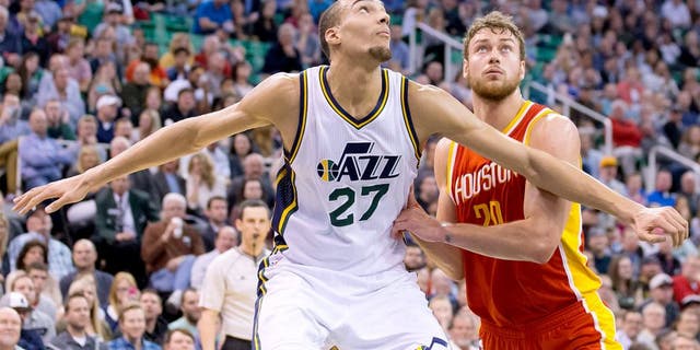 Mar 12, 2015; Salt Lake City, UT, USA; Utah Jazz center Rudy Gobert (27) boxes out Houston Rockets forward Donatas Motiejunas (20) during the first half at EnergySolutions Arena. Mandatory Credit: Russ Isabella-USA TODAY Sports