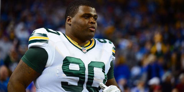 Nov 28, 2013; Detroit, MI, USA; Green Bay Packers defensive end B.J. Raji (90) against the Detroit Lions at Ford Field. Mandatory Credit: Andrew Weber-USA TODAY Sports