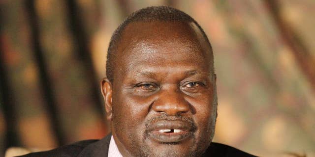 FILE--In this Wednesday, July 8, 2015 file photo, South Sudan rebel leader Riek Machar addresses journalists during a news conference in Nairobi, Kenya. South Sudan's rebel leader is accusing President Salva Kiir of wanting to turn the country into an "ethnic state" for his Dinka group. Riek Machar's statement, obtained by The Associated Press, Sept. 26, 2016, accuses the government of pushing ethnic groups into fighting. (AP Photo/Khalil Senosi, File)