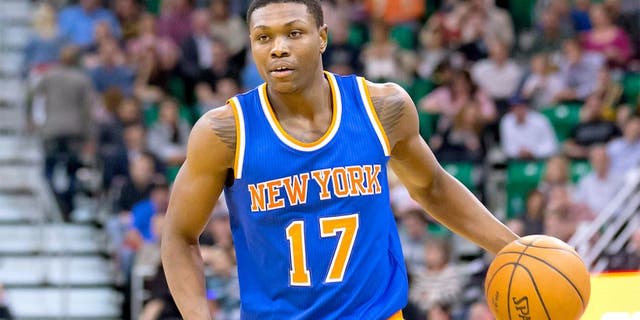 Mar 10, 2015; Salt Lake City, UT, USA; New York Knicks forward Cleanthony Early (17) dribbles the ball during the first half against the Utah Jazz at EnergySolutions Arena. The Jazz won 87-82. Mandatory Credit: Russ Isabella-USA TODAY Sports