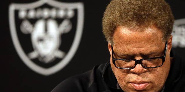 Oakland Raiders general manager Reggie McKenzie takes questions from reporters during a media conference Tuesday, Sept. 30, 2014, in Alameda, Calif. The Oakland Raiders named Tony Sparano as their interim head coach. (AP Photo/Ben Margot)