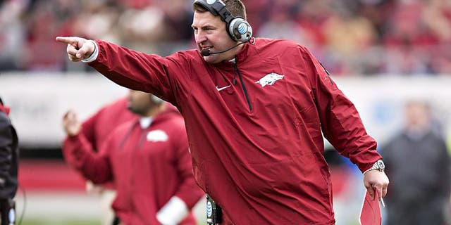 LITTLE ROCK, ARKANSAS - NOVEMBER 23: Head Coach Bret Bielema of the Arkansas Razorbacks points to a official during a game against the Mississippi State Bulldogs at War Memorial Stadium on November 23, 2013 in Little Rock, Arkansas. The Bulldogs defeated the Razorbacks 24-17. (Photo by Wesley Hitt/Getty Images)