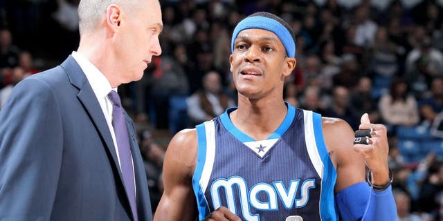 SACRAMENTO, CA - JANUARY 13: Head Coach Rick Carlisle of the Dallas Mavericks coaches Rajon Rondo #9 against the Sacramento Kings on January 13, 2015 at Sleep Train Arena in Sacramento, California. NOTE TO USER: User expressly acknowledges and agrees that, by downloading and or using this photograph, User is consenting to the terms and conditions of the Getty Images Agreement. Mandatory Copyright Notice: Copyright 2015 NBAE (Photo by Rocky Widner/NBAE via Getty Images)