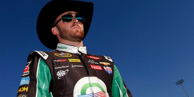 FONTANA, CA - MARCH 18: Austin Dillon, driver of the #3 American Ethanol Chevrolet, walks to the grid during practice for the NASCAR Sprint Cup Series Auto Club 400 at Auto Club Speedway on March 18, 2016 in Fontana, California. (Photo by Jonathan Ferrey/Getty Images)