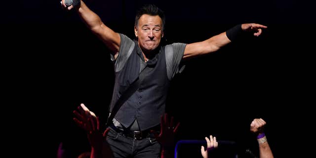 Bruce Springsteen interacts with the crowd during his concert with the E Street Band at the Los Angeles Sports Arena on Tuesday, March 15, 2016, in Los Angeles.