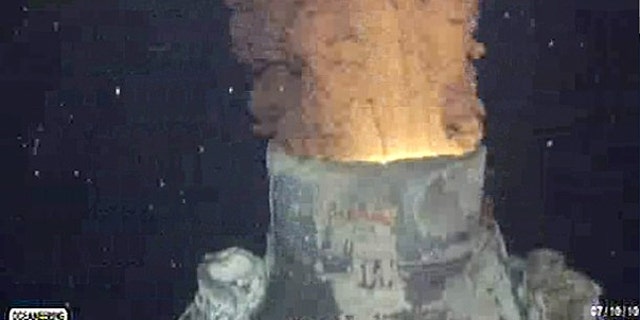 Oil and gas continues to leak from BP's Gulf of Mexico well after the oil containment cap was removed from so it could be replaced with a bigger cap, in the Gulf of Mexico, in this frame grab captured from a BP live video feed.