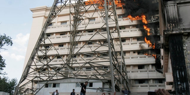 March 22: Flames engulf part of the Interior Ministry complex in Cairo, Egypt.