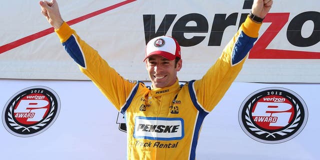 FONTANA, CA - JUNE 26: Race car driver Simon Pagenaud celebrates for winning the Pole Position of the Indy Car MAVTV 500 race at the Auto Club Speedway on June 26, 2015 in Fontana, California. (Photo by Frederick M. Brown/Getty Images)