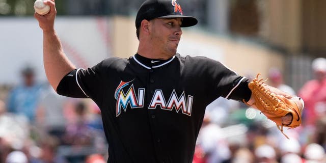 Mar 22, 2016; Jupiter, FL, USA; Miami Marlins starting pitcher Jose Fernandez (16) delivers a pitch during a spring training game against the Boston Red Sox at Roger Dean Stadium. Mandatory Credit: Steve Mitchell-USA TODAY Sports