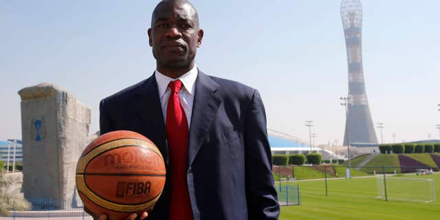 Nov. 12, 2012: ormer NBA star Dikembe Mutombo of U.S. poses before the start of a news conference at the Sports Congress and Exhibition at Aspire Dome in Doha .