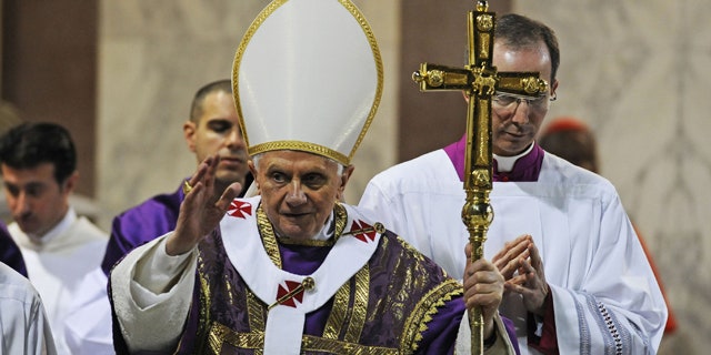 March 9: Pope Benedict XVI salutes the faithful during the traditional Ash Wednesday mass in the St. Sabina church in Rome.