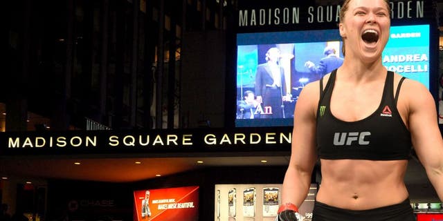 NEW YORK - NOVEMBER 30: The exterior of Madison Square Garden is seen prior to Andrea Bocelli's concert on November 30, 2006 in New York City. (Photo by Rob Loud/Getty Images), LOS ANGELES, CA - FEBRUARY 28: Ronda Rousey celebrates her victory over Cat Zingano in their UFC women's bantamweight championship bout during the UFC 184 event at Staples Center on February 28, 2015 in Los Angeles, California. (Photo by Harry How/Getty Images)