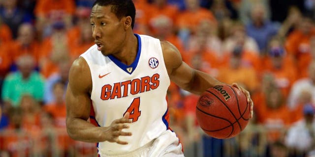 Mar 1, 2016; Gainesville, FL, USA; Florida Gators guard KeVaughn Allen (4) drives to the basket against the Kentucky Wildcats during the first half at Stephen C. O'Connell Center. Mandatory Credit: Kim Klement-USA TODAY Sports