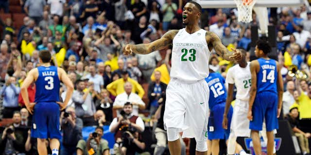 Oregon forward Elgin Cook celebrates after their win against Duke during an NCAA college basketball game in the regional semifinals of the NCAA Tournament, Thursday, March 24, 2016, in Anaheim, Calif.