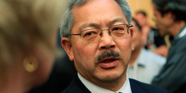 San Francisco Mayor Ed Lee speaks with attendees at the Web 2.0 Summit in San Francisco, California.