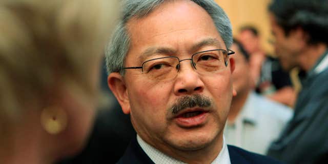 San Francisco Mayor Ed Lee speaks with attendees at the Web 2.0 Summit in San Francisco, California.