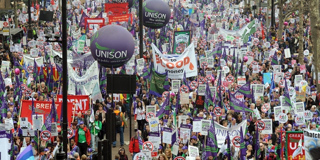 March 26: Demonstrators begin their march in London to protest against government spending cuts.