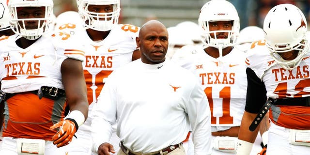 Oct 11, 2014; Dallas, TX, USA; Texas Longhorns head coach Charlie Strong takes the field with his team before the game against the Oklahoma Sooners at the Cotton Bowl. Mandatory Credit: Tim Heitman-USA TODAY Sports