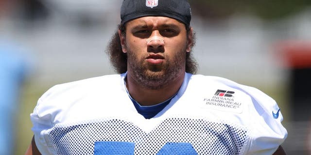Jul 29, 2013; Anderson, IN, USA; Indianapolis Colts offensive guard Khaled Holmes (56) runs on the field during the Indianapolis Colts training camp at Anderson University. Mandatory Credit: Brian Spurlock-USA TODAY Sports