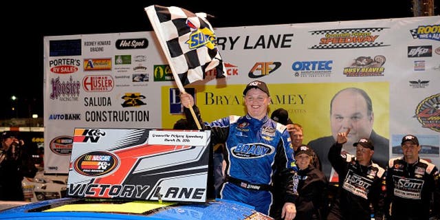 GREENVILLE, SC - MARCH 26: Justin Haley, driver of the #5 Braun Auto Chevrolet, celebrates in Victory Lane after winning the NASCAR K&N Pro Series East Kevin Whitaker Chevrolet 150 at Greenville Pickens Speedway on March 26, 2016 in Greenville, South Carolina. (Photo by Grant Halverson/NASCAR via Getty Images)