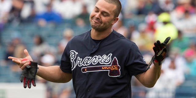 Mar 19, 2016; Tampa, FL, USA; Atlanta Braves first baseman Nick Swisher (23) reacts to the catch made by New York Yankees center fielder Jacoby Ellsbury (not pictured) during the first inning at George M. Steinbrenner Field. Mandatory Credit: Jerome Miron-USA TODAY Sports