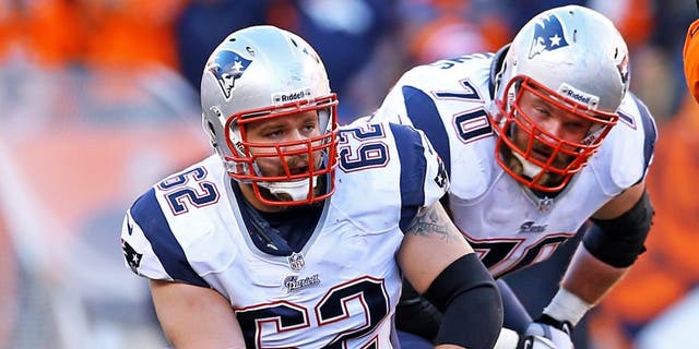 January 19, 2014; Denver, CO, USA; New England Patriots offensive lineman Ryan Wendell (62) and guard Logan Mankins (70) against the Denver Broncos in the 2013 AFC Championship football game at Sports Authority Field at Mile High. Mandatory Credit: Mark J. Rebilas-USA TODAY Sports