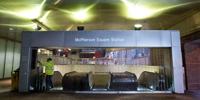 March 16, 2016: Metro employee shuts down escalators to the McPherson Square Station in Washington.